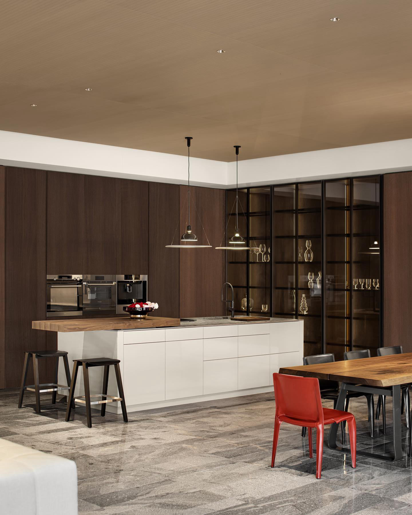 Dark stained oak sets the tone, creating a stylish statement with a strong connection to nature righ