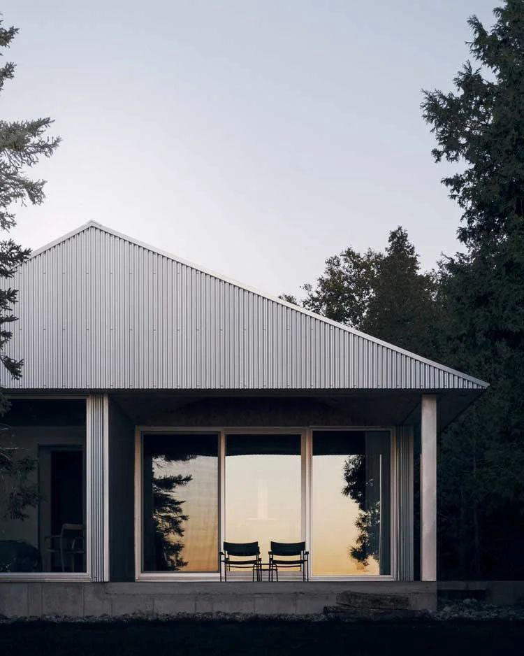 reflective and robust, 'devil's glen' by #studioac_architecture recalls the canadian farmhouse