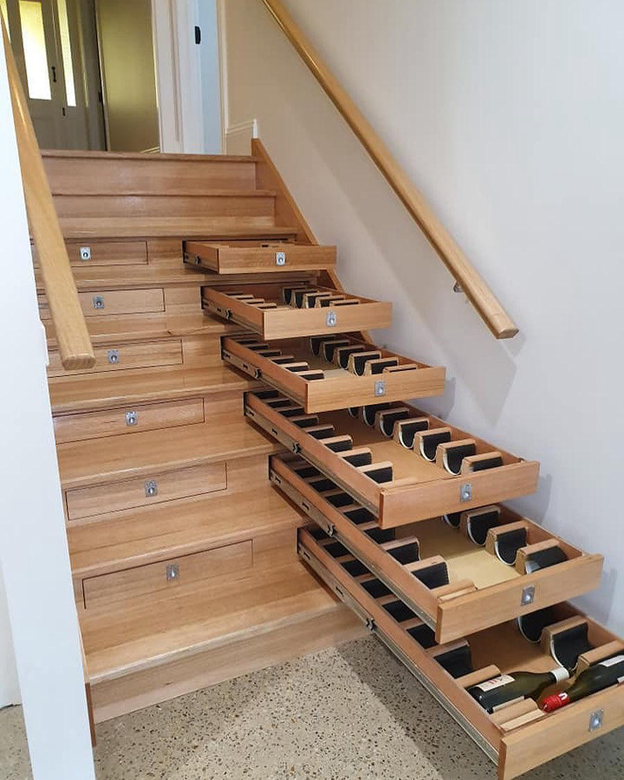 Staircase system that doubles as storage for 156 wine box created by Murray Berrill⁣•⁣•⁣•#Design_Onl